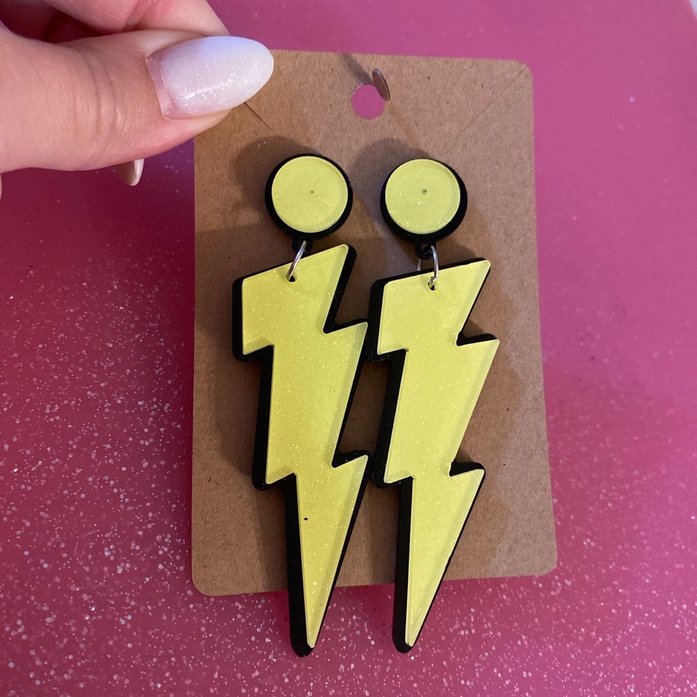 Sparkly yellow/black lightning bolt earrings